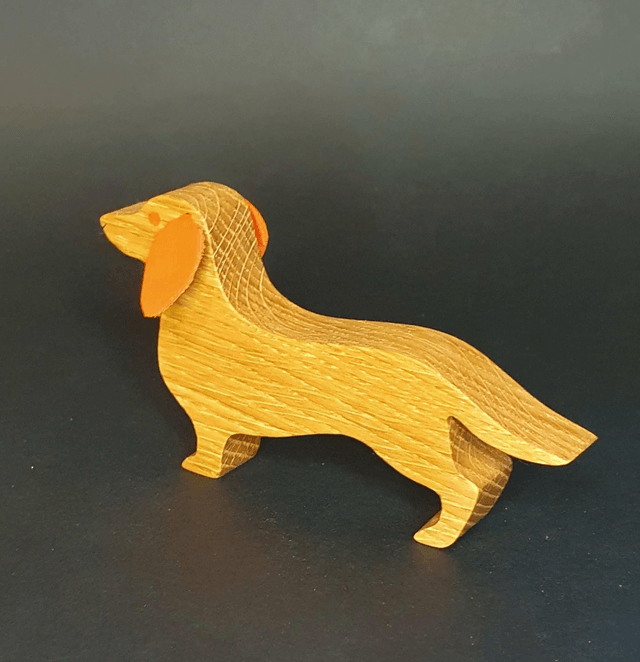 Teckel décoratif en bois et cuir rouge orangé 