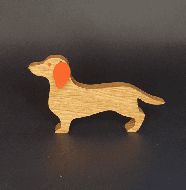 Teckel décoratif en bois et cuir rouge orangé 