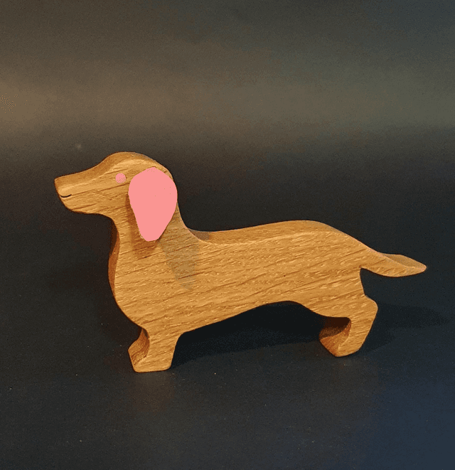 Teckel décoratif en bois et cuir rose